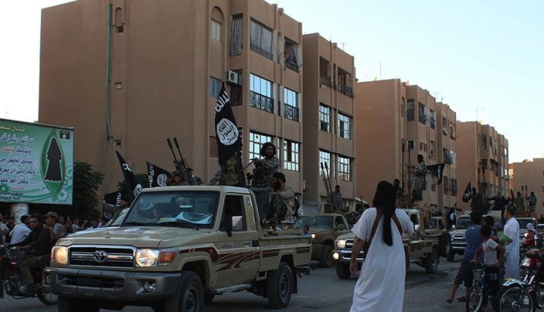 An image made available by Jihadist media outlet Welayat Raqqa on June 30, 2014, allegedly shows a member of the IS (Islamic state) militant group parading in a street in the northern rebel-held Syrian city of Raqqa. (Photo: AFP-Welayat Raqqa)