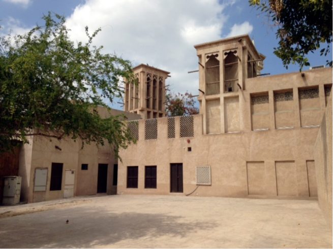 A wind tower with an Al arish house.
